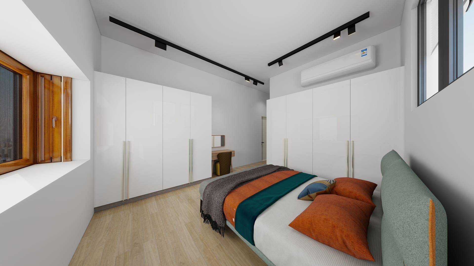 Design visualisation of the enlarged bedroom with tall white wardrobes on two walls, a timber dressing table, ceiling track lighting, and a bed with teal and rust bedding